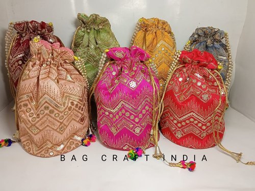 Shubh Shagun Women's Rajasthani Silk Potli Bag to Carry on Lehenga  choli/Saree/salwar Suit (Pink & White) : Amazon.in: Shoes & Handbags